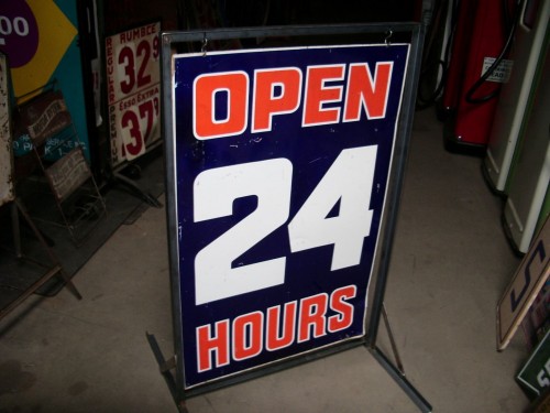 Open 24 Hrs freestanding sign