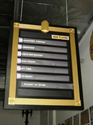 "Now Playing" Sign.