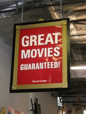 "Great Movies Guaranteed" Sign.