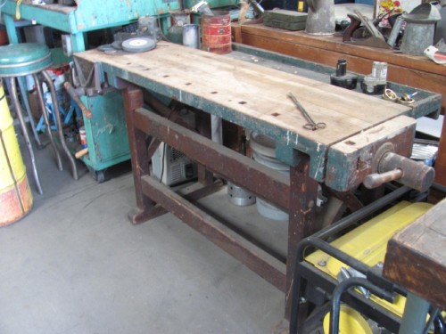 Vintage wood work table with wood vice