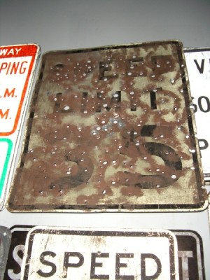 Bullet Holes sign